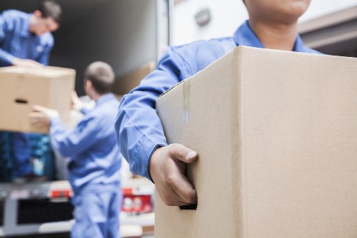 Professional removalist team packing a house in France
