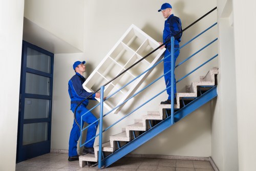 Customer consulting with removal service provider