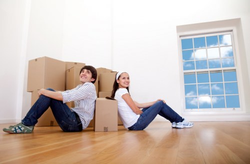 Van loaded with moving boxes and furniture ready for transport