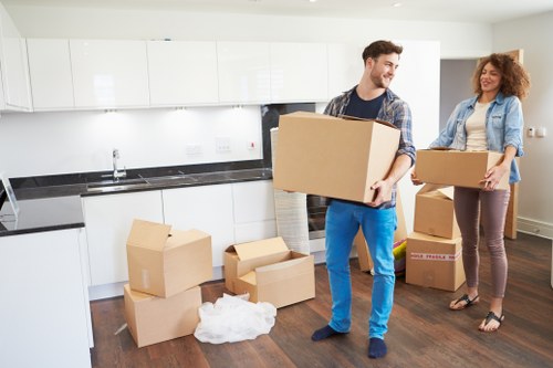 Experienced movers assisting with furniture assembly