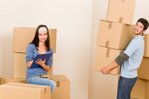 Unpacking services arranging furniture in a new home